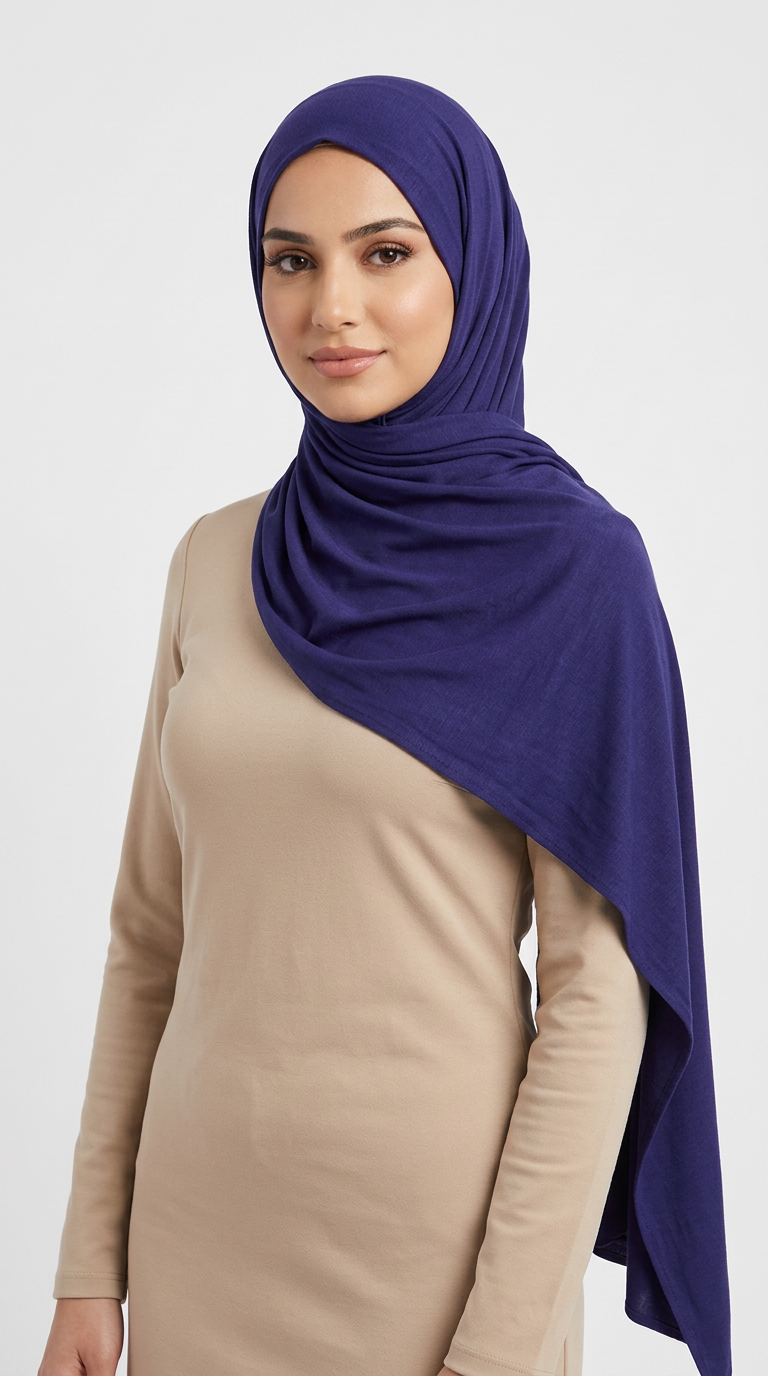 Woman wearing the Navy Big Jersey Hijab with a beige top