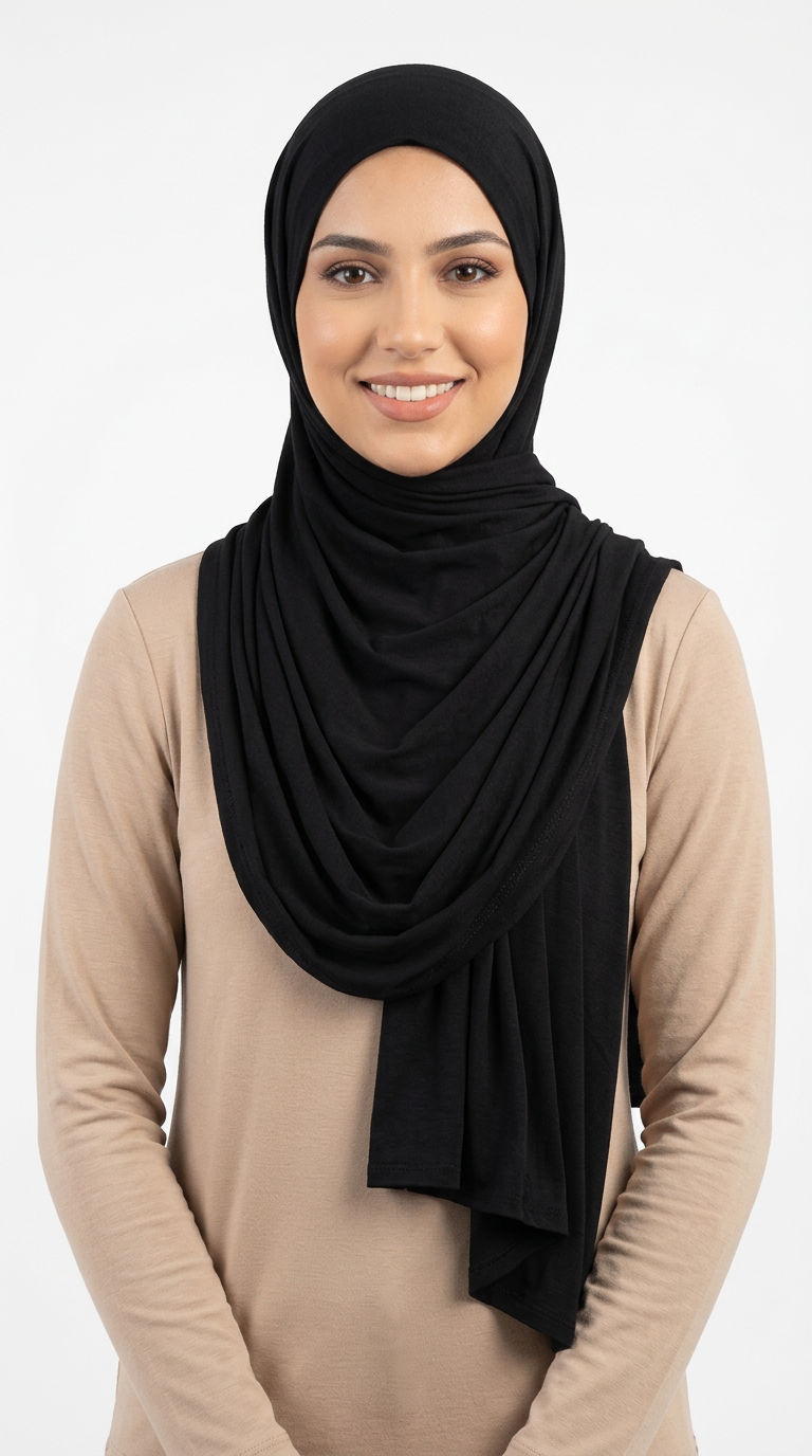 Woman wearing the Black Big Jersey Hijab with a beige top