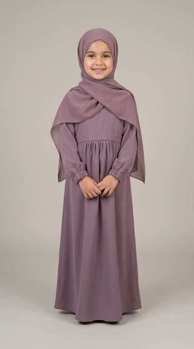 Girl wearing a purple front-pocket abaya with matching hijab.