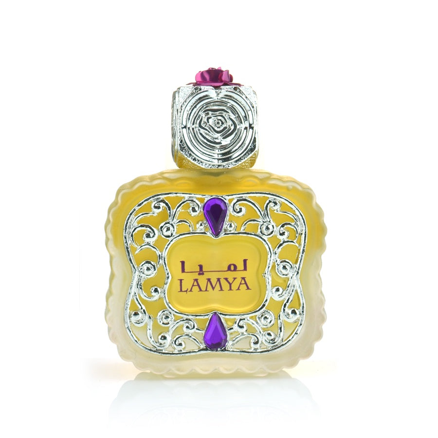 A perfume bottle with intricate floral detailing and a purple stone embellishment on the cap.