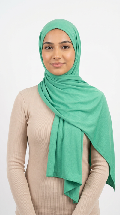 Model wearing a mint green Premium Jersey Hijab