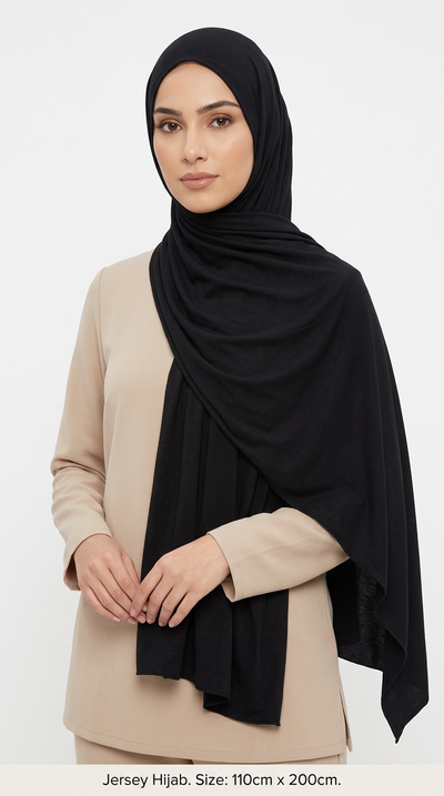 Woman wearing the Black Big Jersey Hijab with a beige top