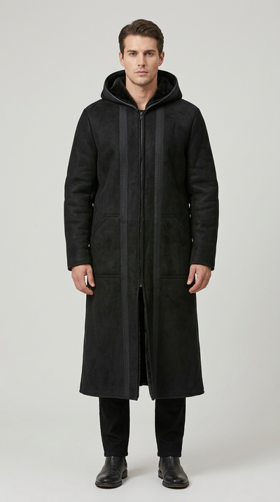 Model wearing a black Farwa Half Zip Hoody with a long hooded silhouette