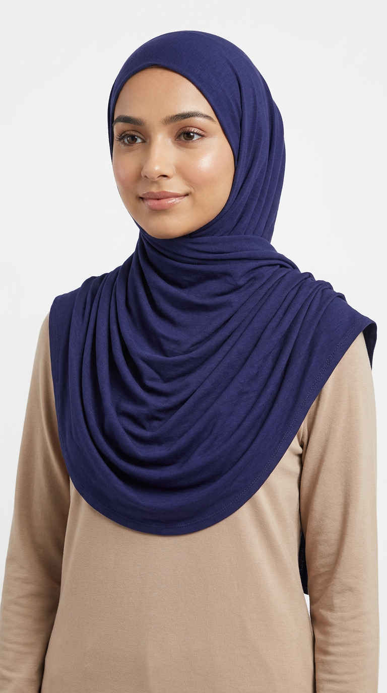 Woman wearing the Navy Big Jersey Hijab with a beige top