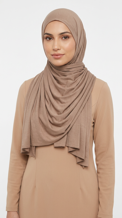 Woman wearing the Tortilla Big Jersey Hijab with a beige top