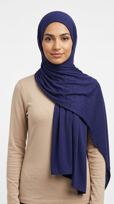 Woman wearing the Navy Big Jersey Hijab with a beige top