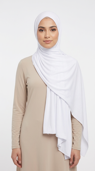 Woman wearing the White Big Jersey Hijab with a beige top