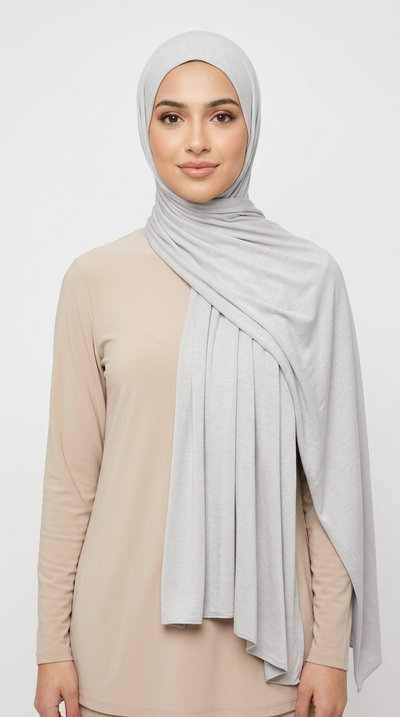 Woman wearing the Cloud Big Jersey Hijab with a beige top