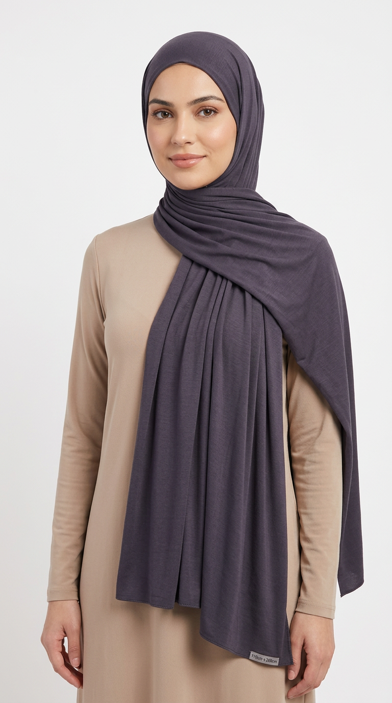 Woman wearing the Iron Big Jersey Hijab with a beige top