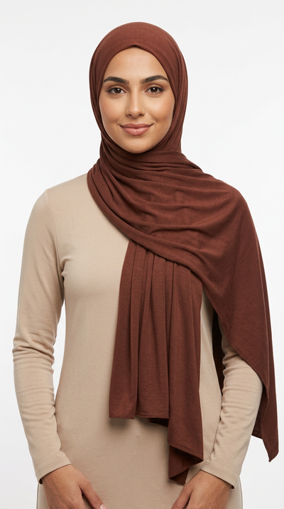 Woman wearing the Syrup Big Jersey Hijab with a beige top