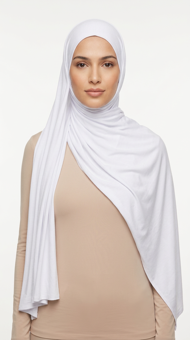 Woman wearing the White Big Jersey Hijab with a beige top