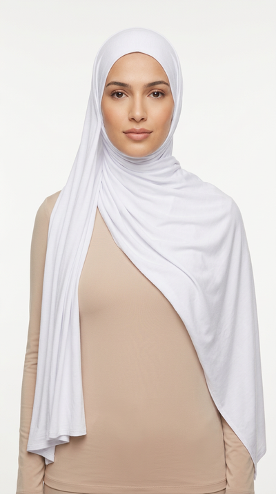 Woman wearing the White Big Jersey Hijab with a beige top