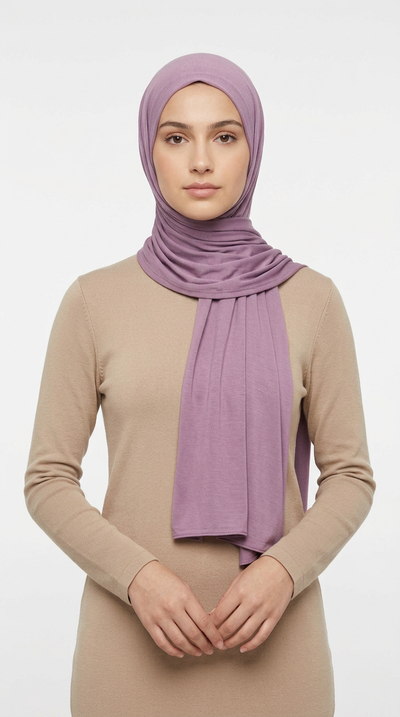 Woman wearing the Mulberry Big Jersey Hijab with a beige top