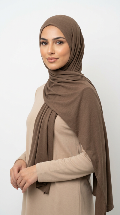 Woman wearing the Cedar Big Jersey Hijab with a beige top