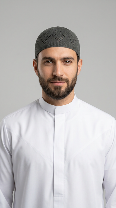 Man wearing a Tea gray topi prayer cap, front view