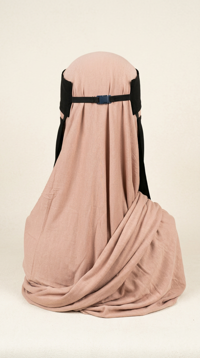 Rear view of the black Clip Niqab 07 fastening over a peach hijab