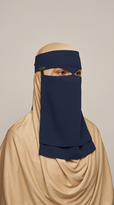 Navy Nose Pinch Niqab with a beige hijab, front view