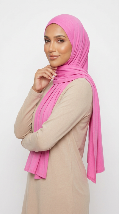 Woman wearing the Rose Pink Big Jersey Hijab with a beige top