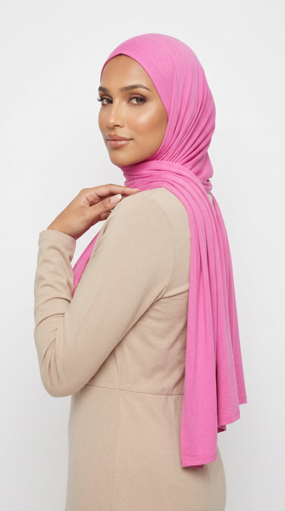 Woman wearing the Rose Pink Big Jersey Hijab with a beige top