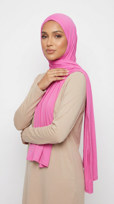 Woman wearing the Rose Pink Big Jersey Hijab with a beige top