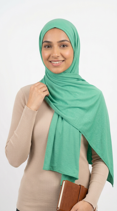 Model wearing a mint green Premium Jersey Hijab