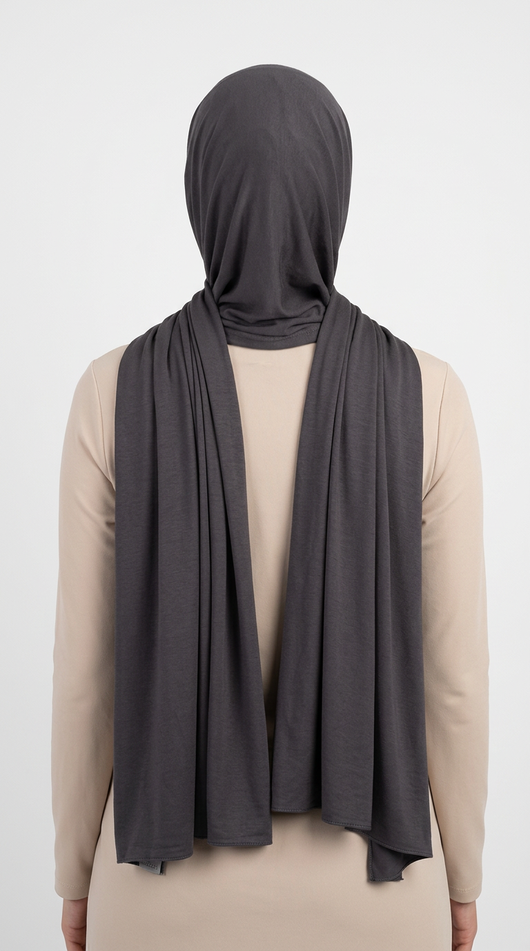 Model wearing a charcoal gray Premium Jersey Hijab, back view