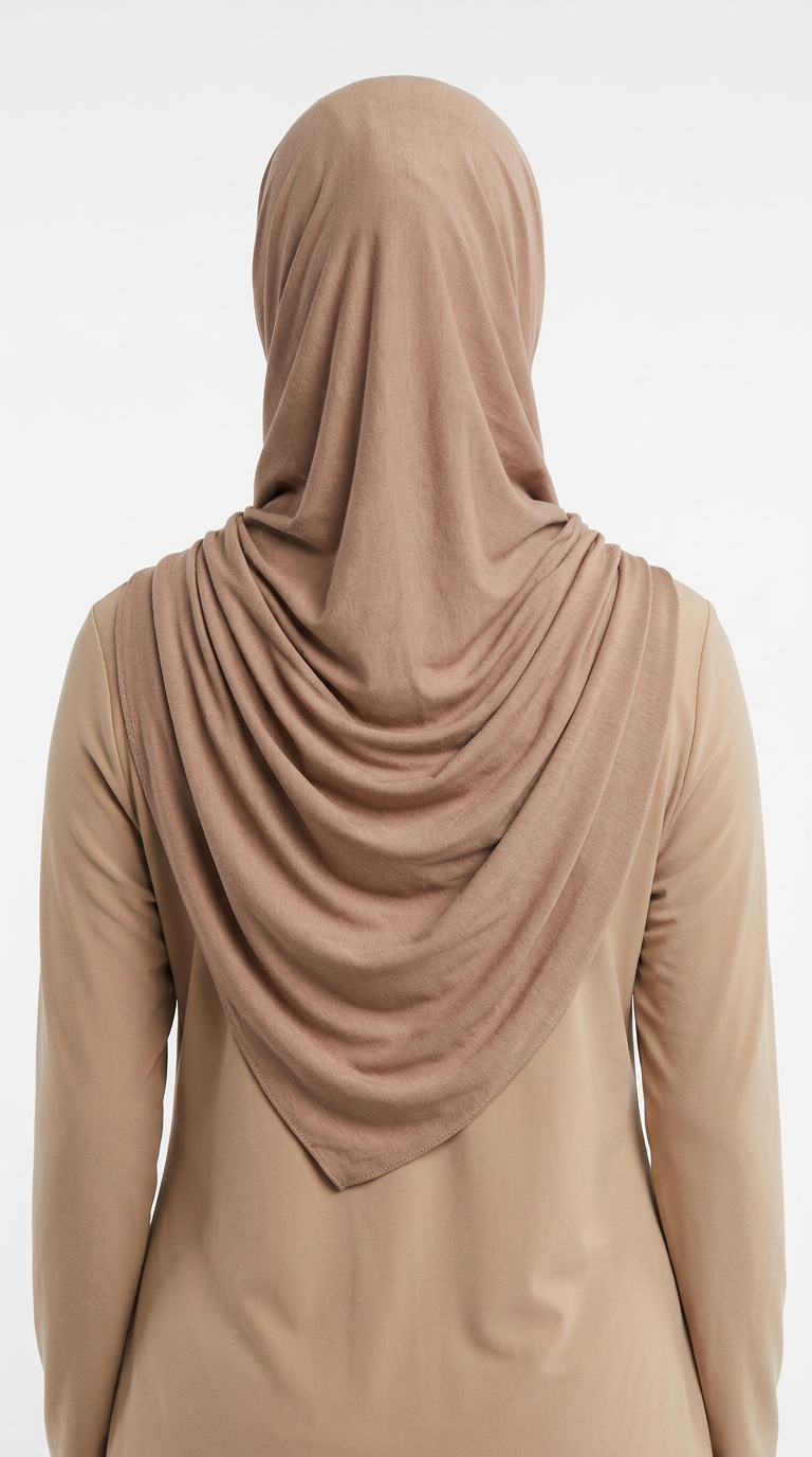 Model wearing a camel brown Premium Jersey Hijab, back view
