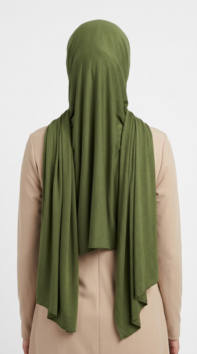 Model wearing a olive green Premium Jersey Hijab, back view