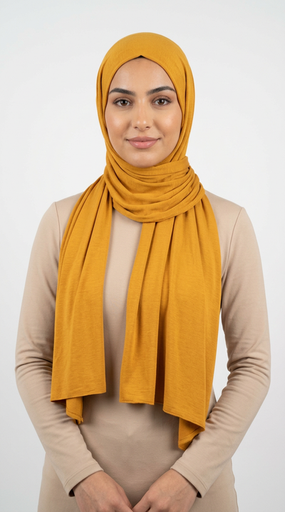 Model wearing a mustard yellow Premium Jersey Hijab