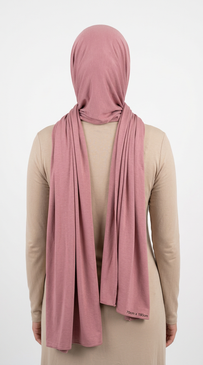 Model wearing a rose Premium Jersey Hijab, back view