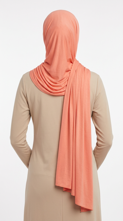 Model wearing a dusty rose Premium Jersey Hijab, back view