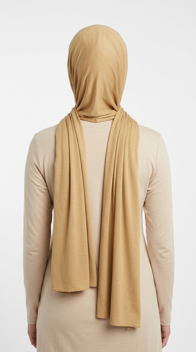 Model wearing a sand Premium Jersey Hijab, back view