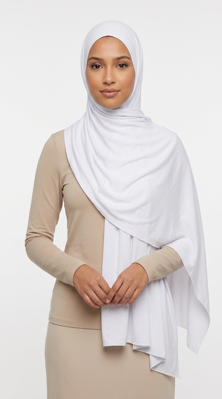 Woman wearing the White Big Jersey Hijab with a beige top