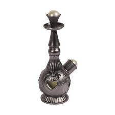 A bottle of Khadlaj ASTOORA concentrated perfume oil with a decorative element in the design, possibly reflecting the product's luxurious nature.