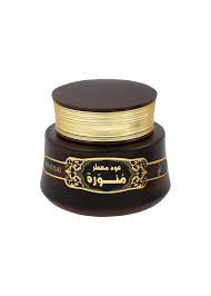 A jar of Khadlaj OUD MUATTAR MUNAWWARA 35 G with a gold lid, displaying labels in Arabic.
